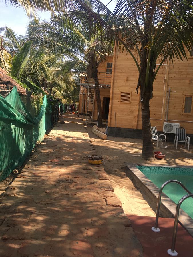 Tiara Fiesta Beach Cottages Morjim Exterior foto